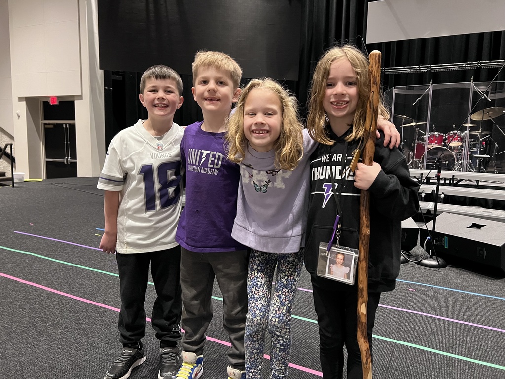 group of students standing on stage