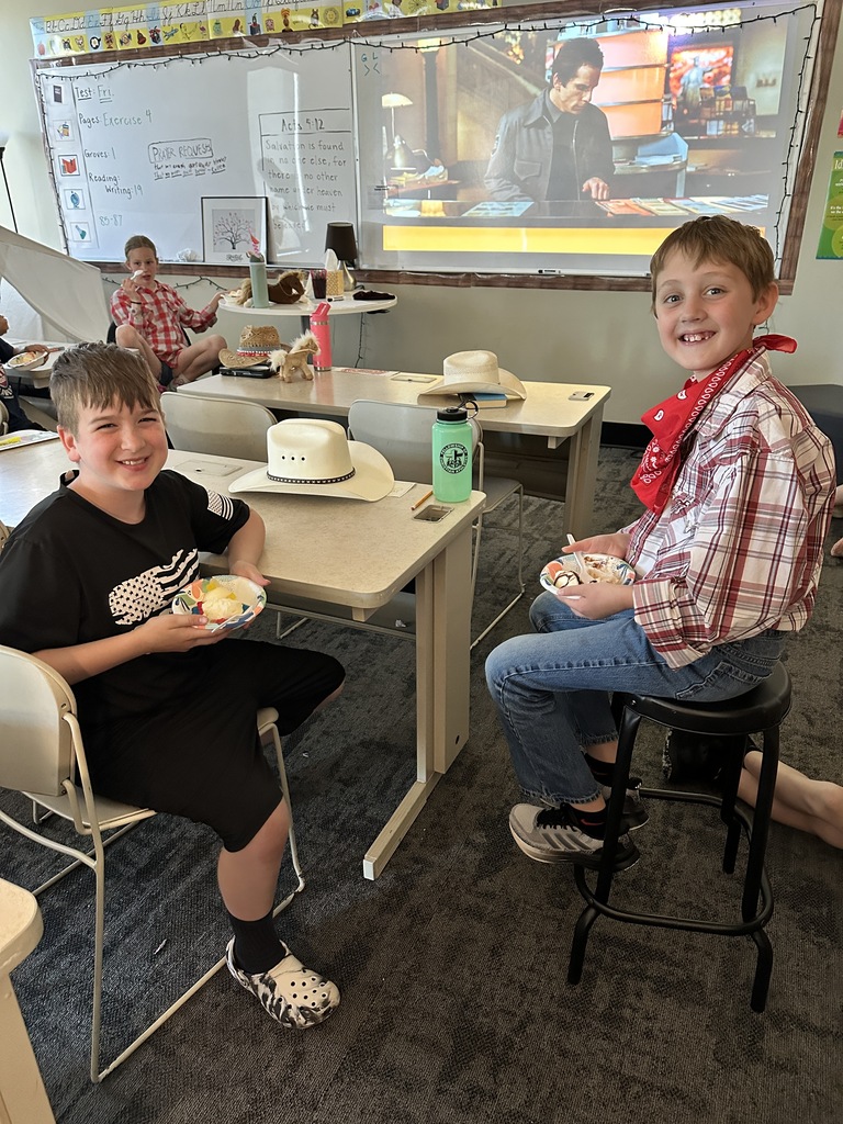 students eating ice cream and watching a movie