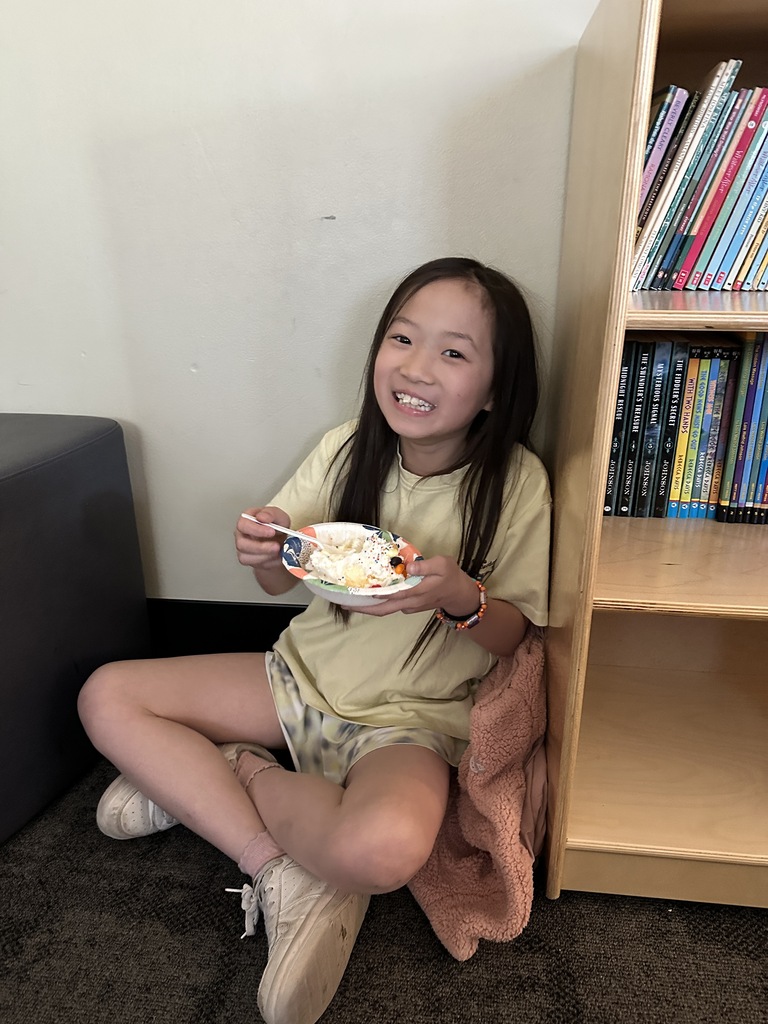 student with a bowl of ice cream