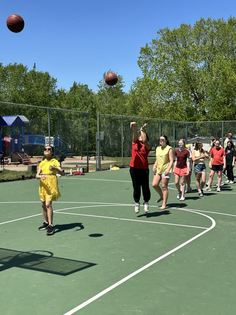 teenagers playing basketball