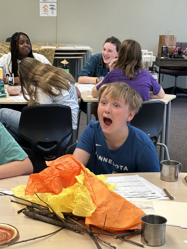 students working in groups on a team project
