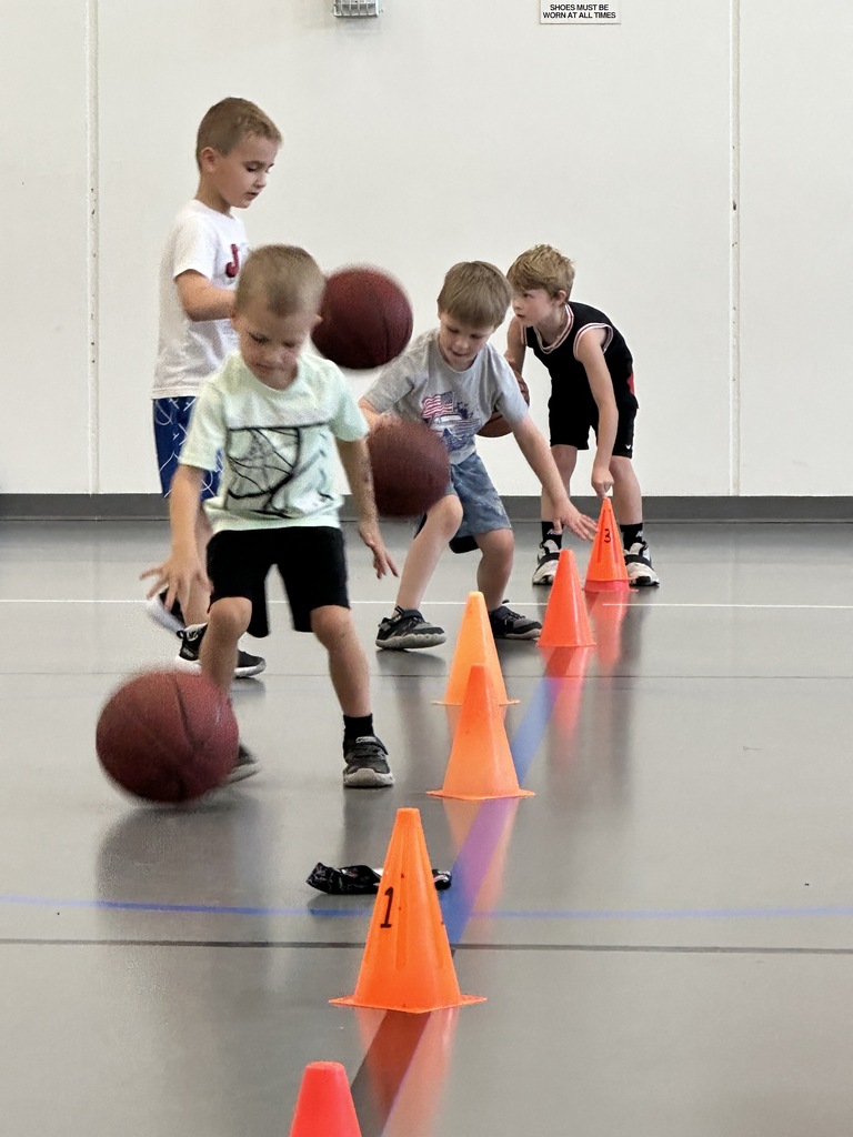 young boys playing basketball