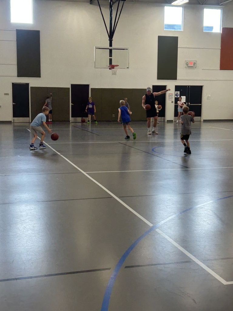 young boys playing basketball