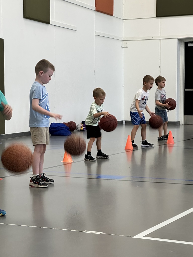 young boys playing basketball