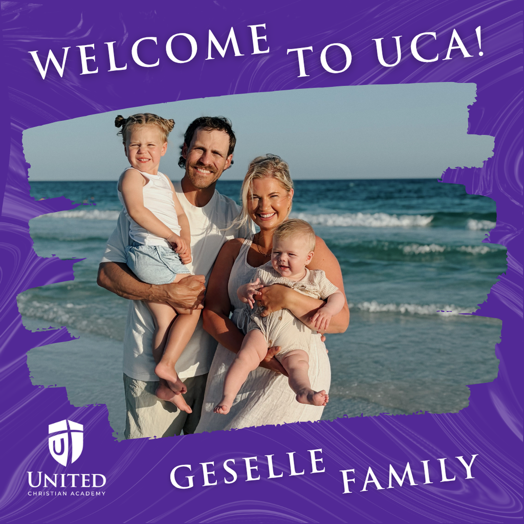 family standing on a beach by the ocean