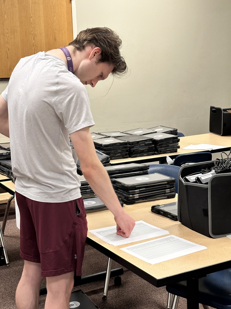 man looking at a list of names