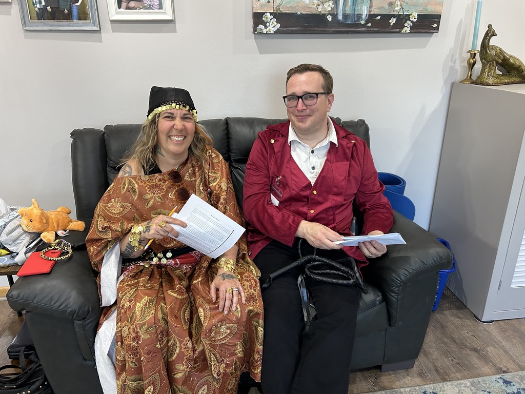 husband and wife sitting on a couch