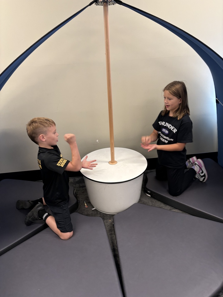 students playing rock, paper, scissors