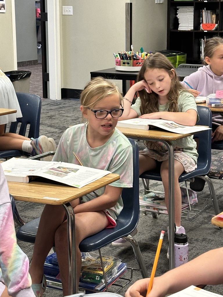 students working at their desk