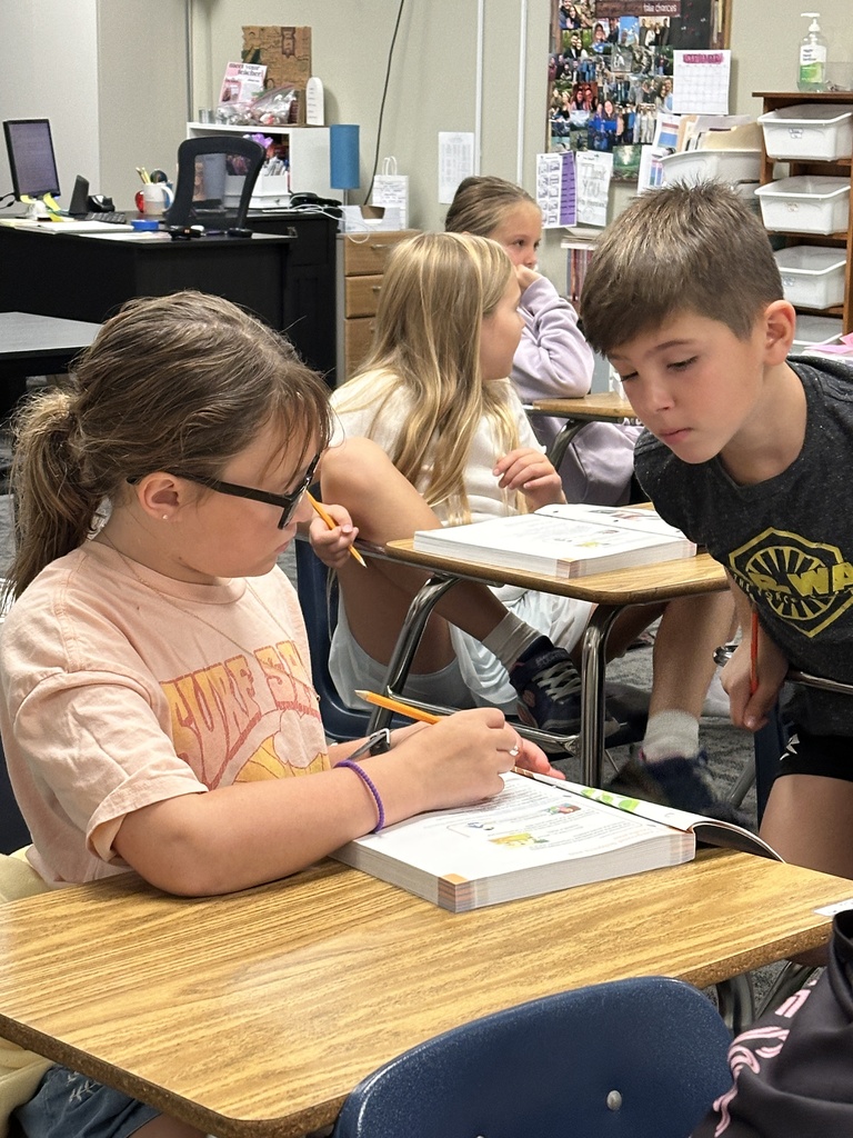 students working at their desk