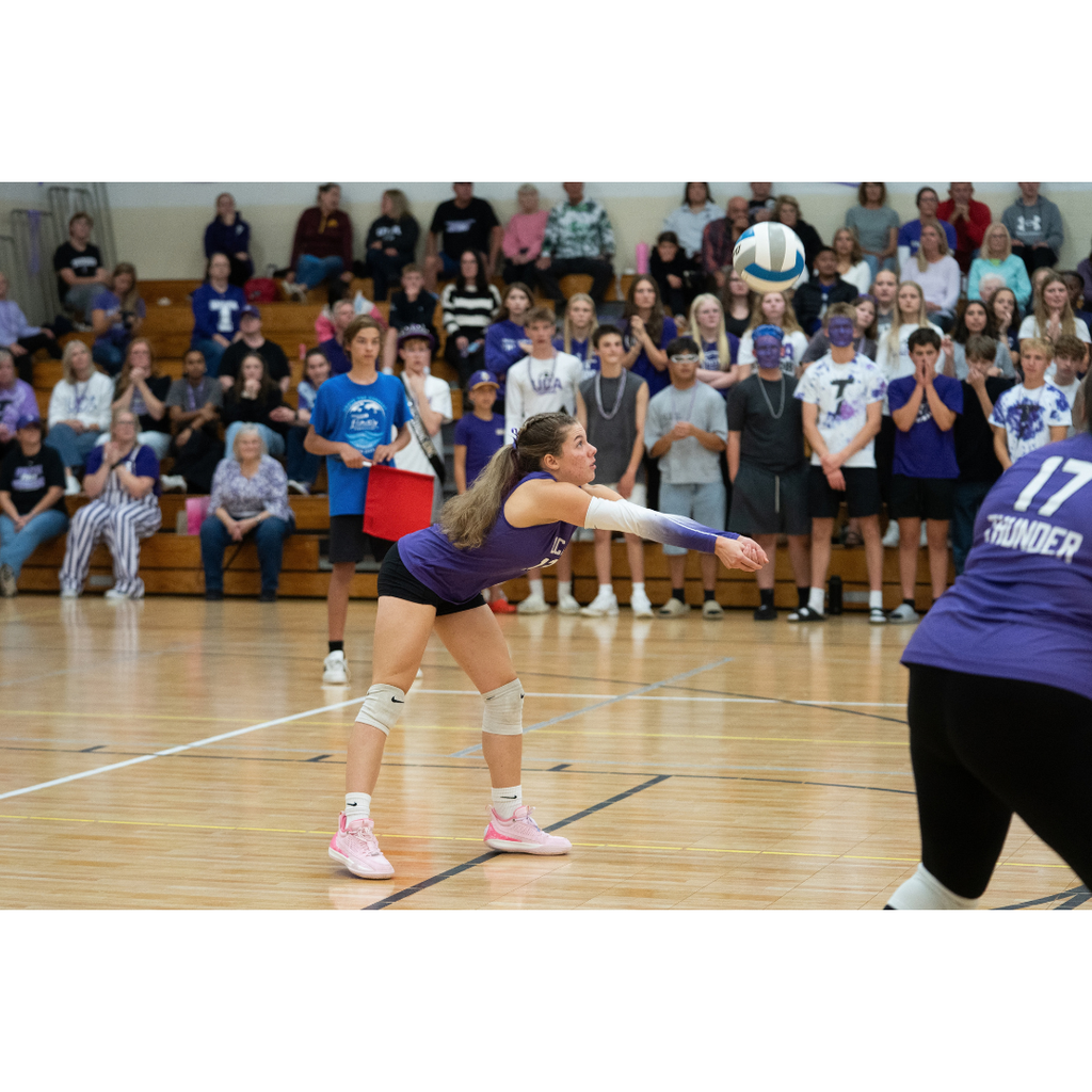 high school girls playing volleyball