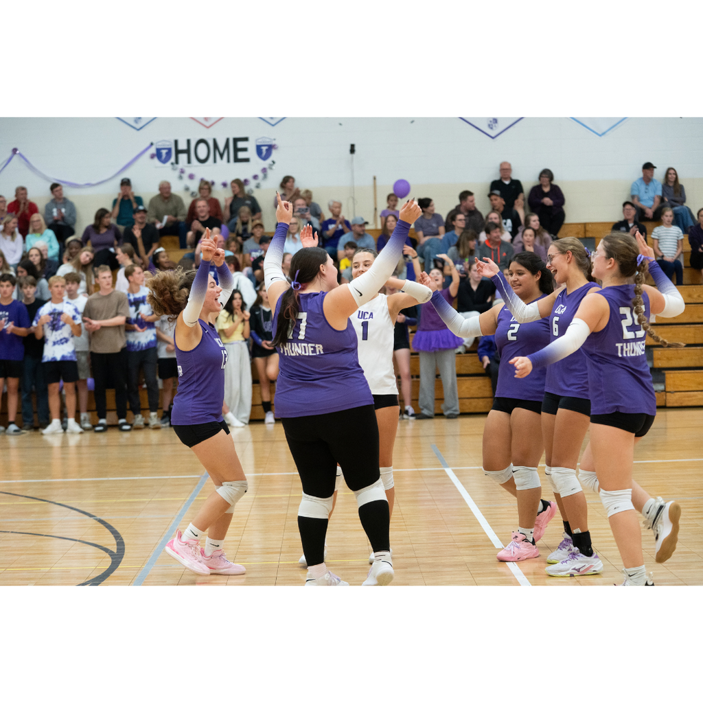 high school girls playing volleyball