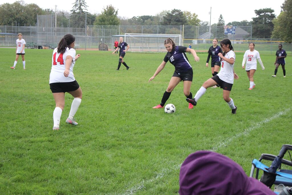 girls playing soccer