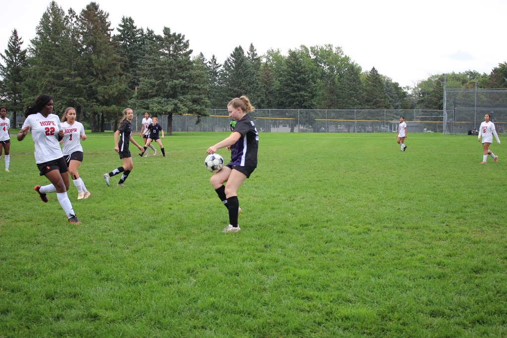 girls playing soccer
