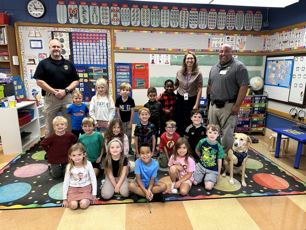 group photo of kindergarteners and police officers