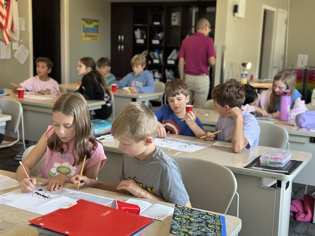 students working in pairs at their desks