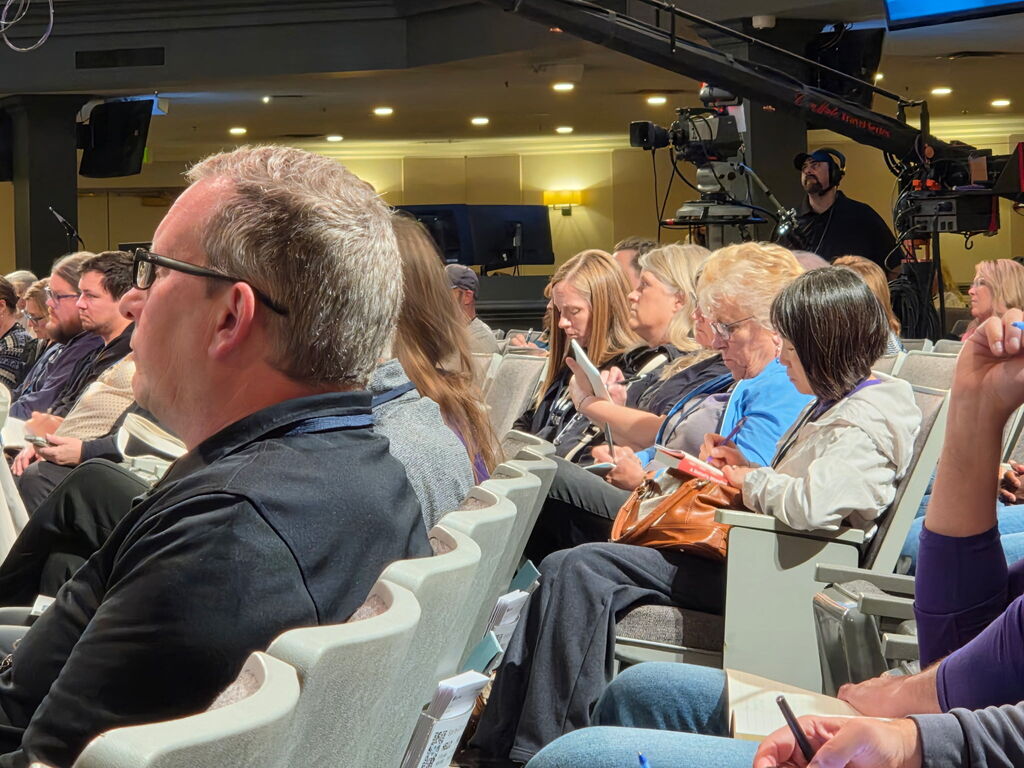 people sitting in an auditorium