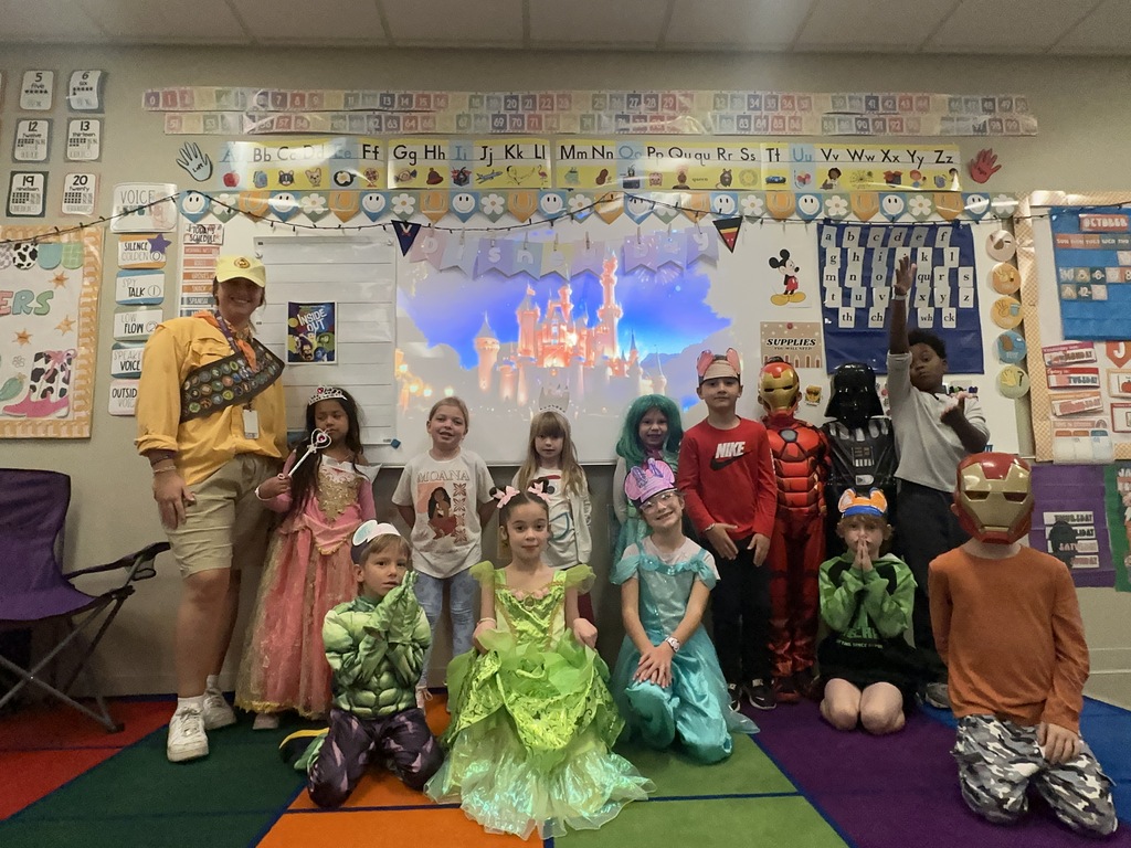 group photo of students dressed in Disney costumes