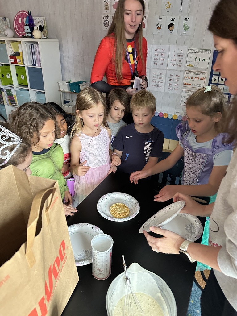 students looking at a Mickey Mouse waffle
