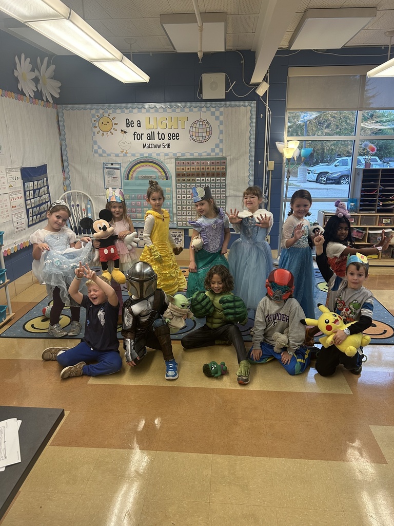 group photo of students dressed in Disney costumes