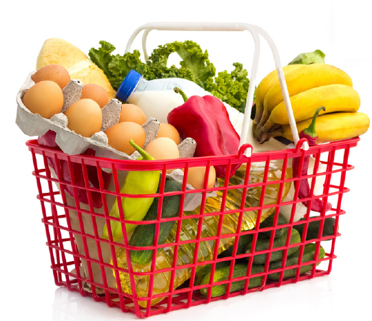 Red grocery basket full of food.