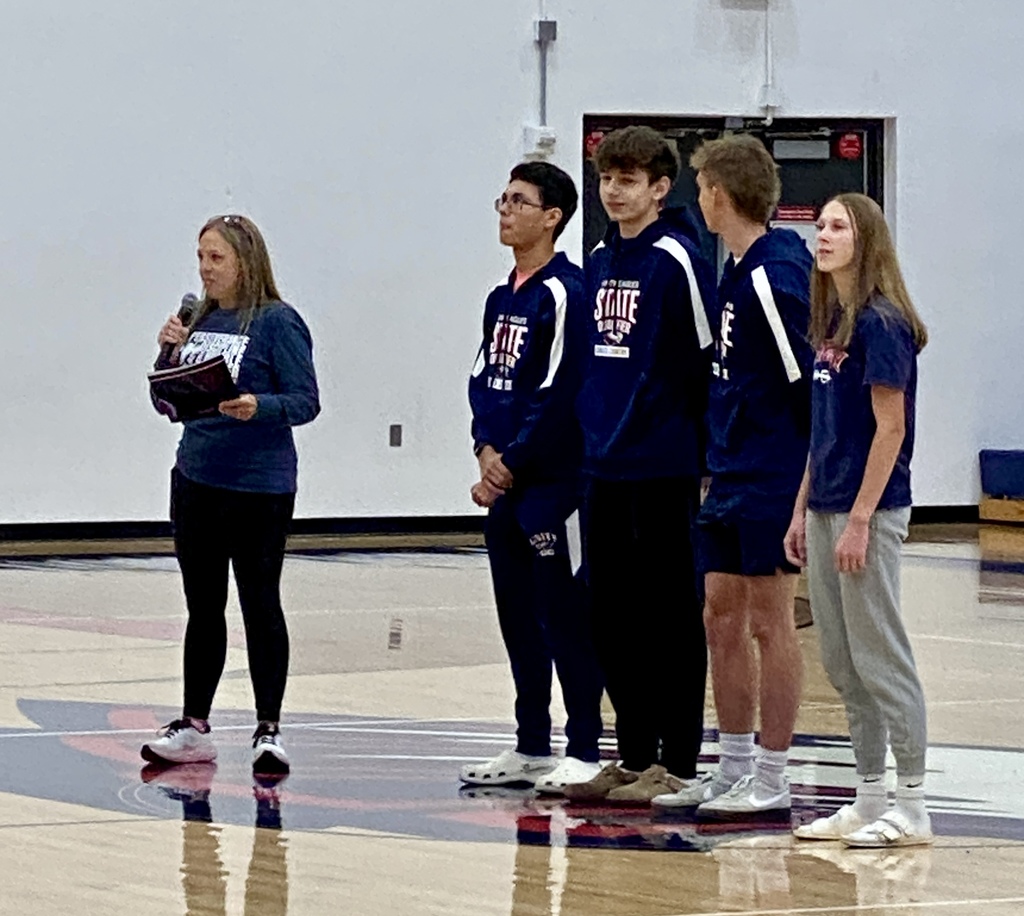 Coach Birling with Ava, Oliver, Dominic, and Isaiah