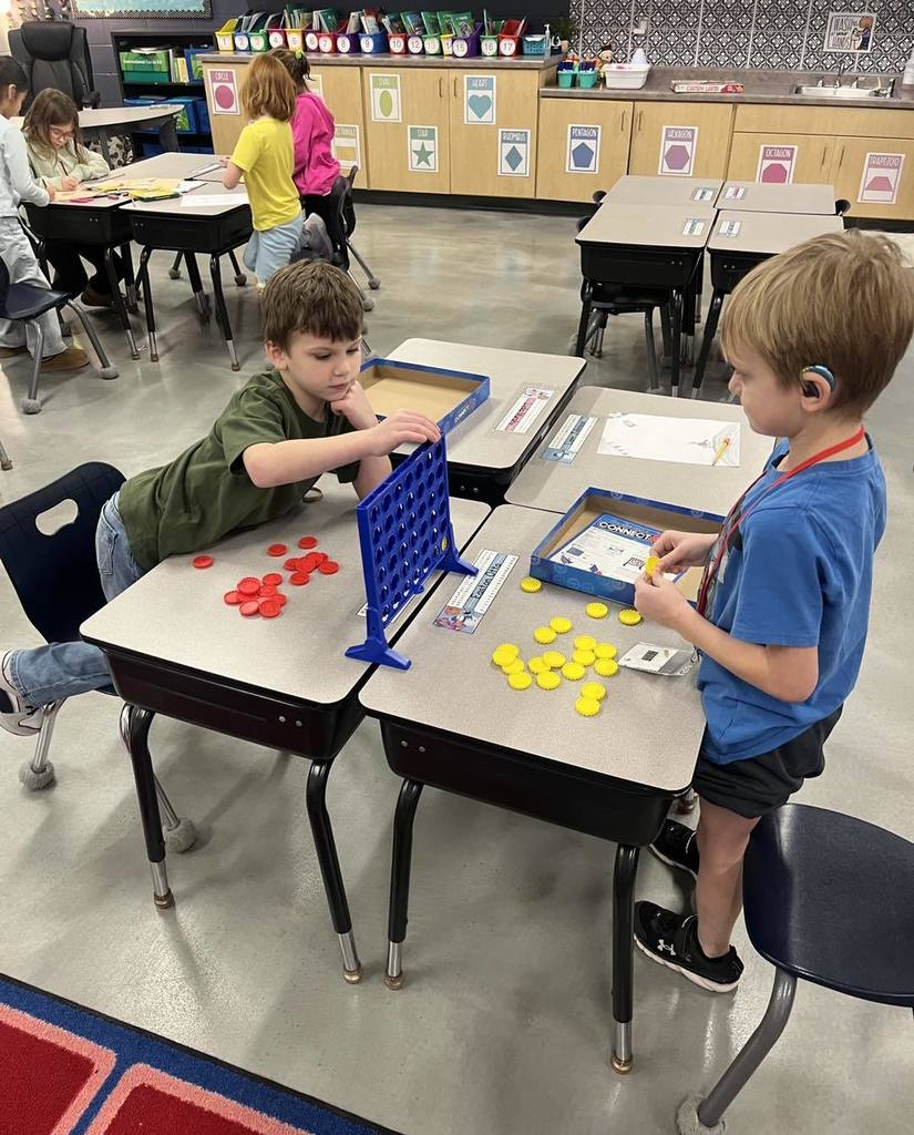 pictures of Children playing games during inside recess 