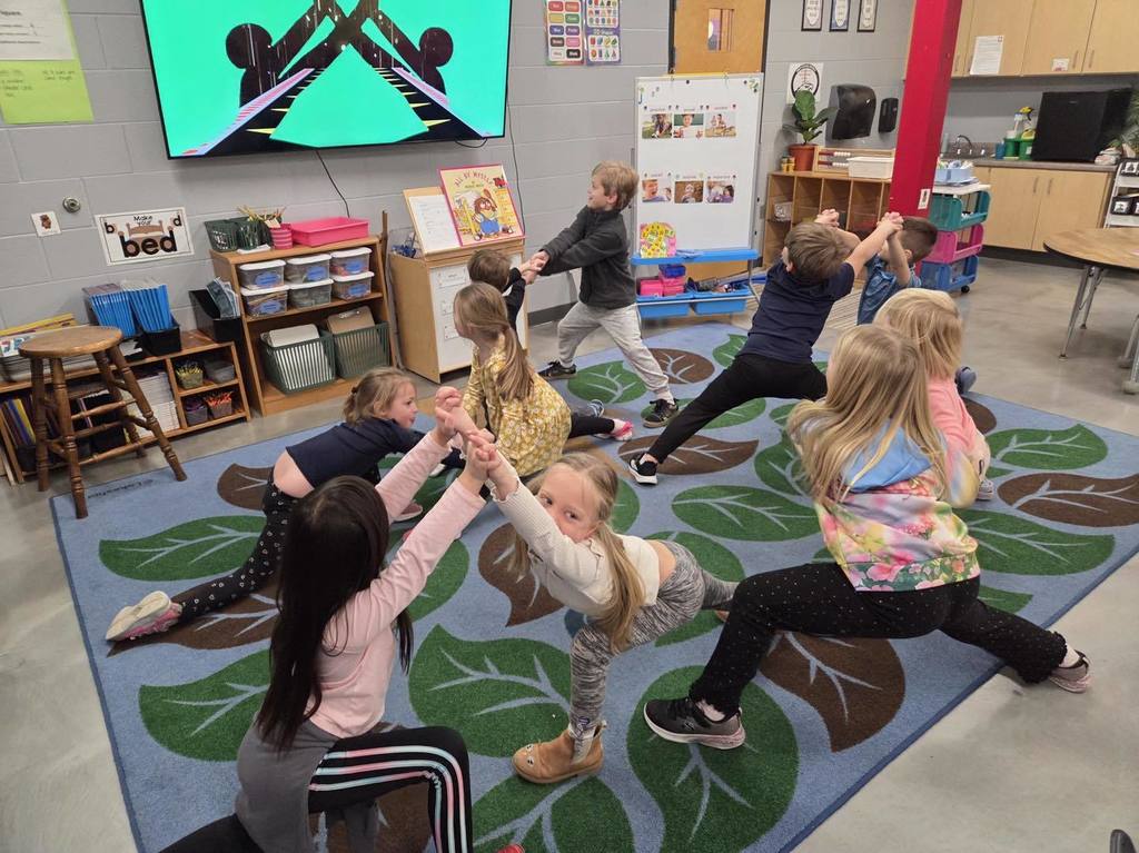 picture of kindergarten class going playing a game