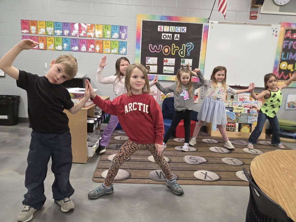 picture of kindergarten class going playing a game