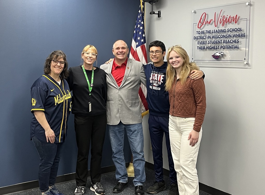 Senior Kyra Cox, Junior Dominic Fox, and club advisors posing with Representative Duke Tucker at Unity School District.