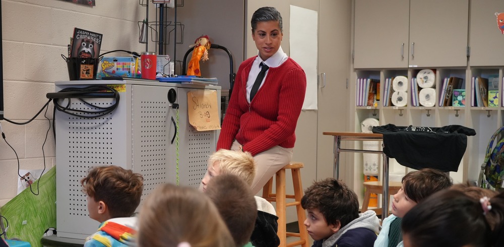 teacher dressed as Mr. Rogers