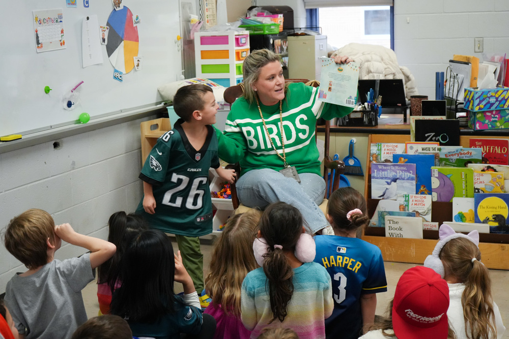 students with teacher