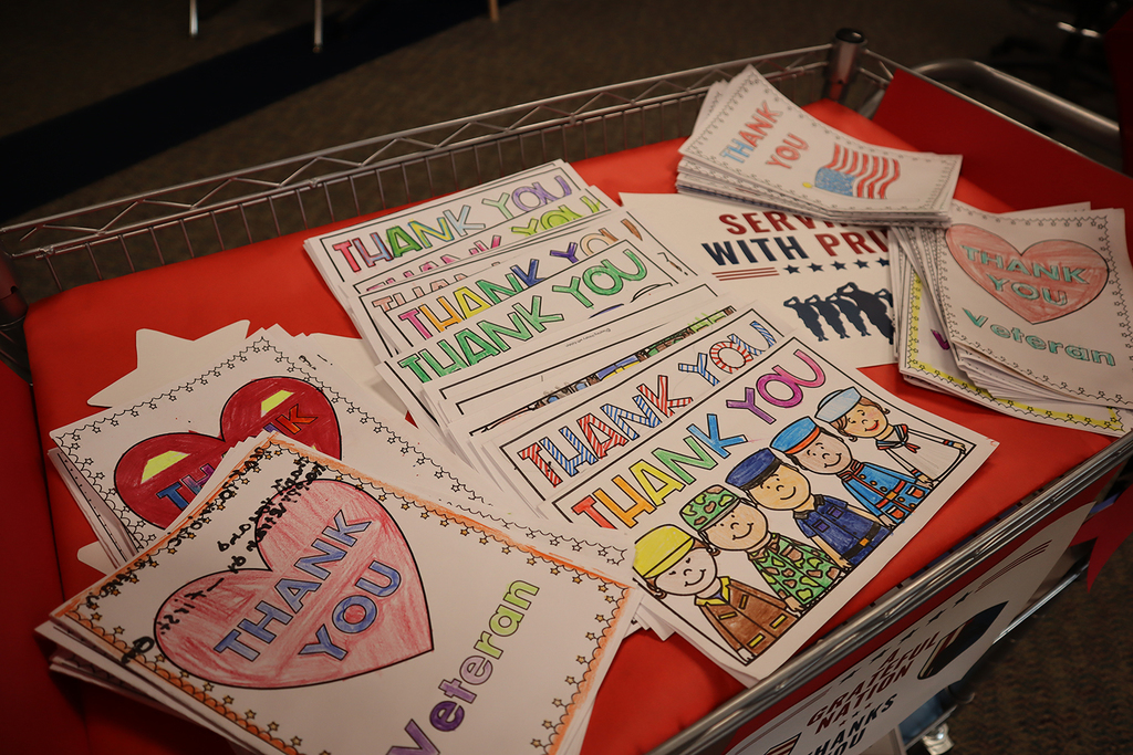 Piles of handmade cards made by students for veteran's day