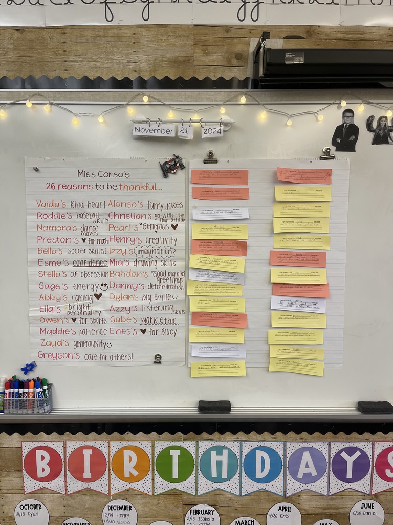 Thank you notes posted on the whiteboard