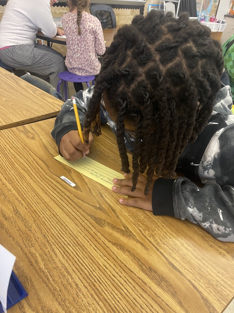 Student working on thank you note