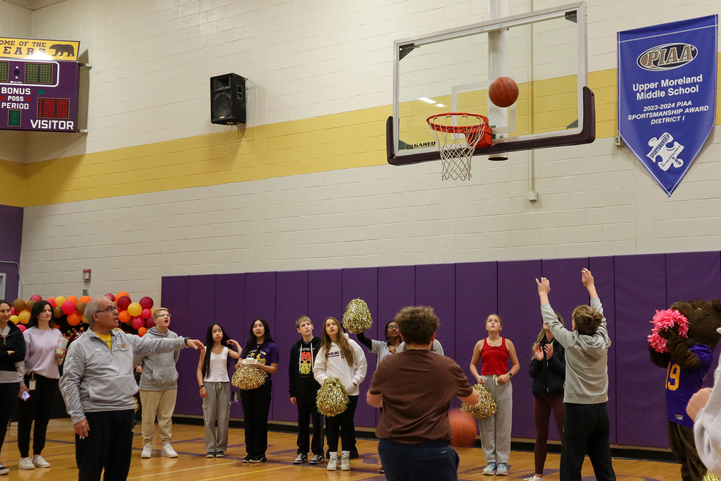 Students playing basketball