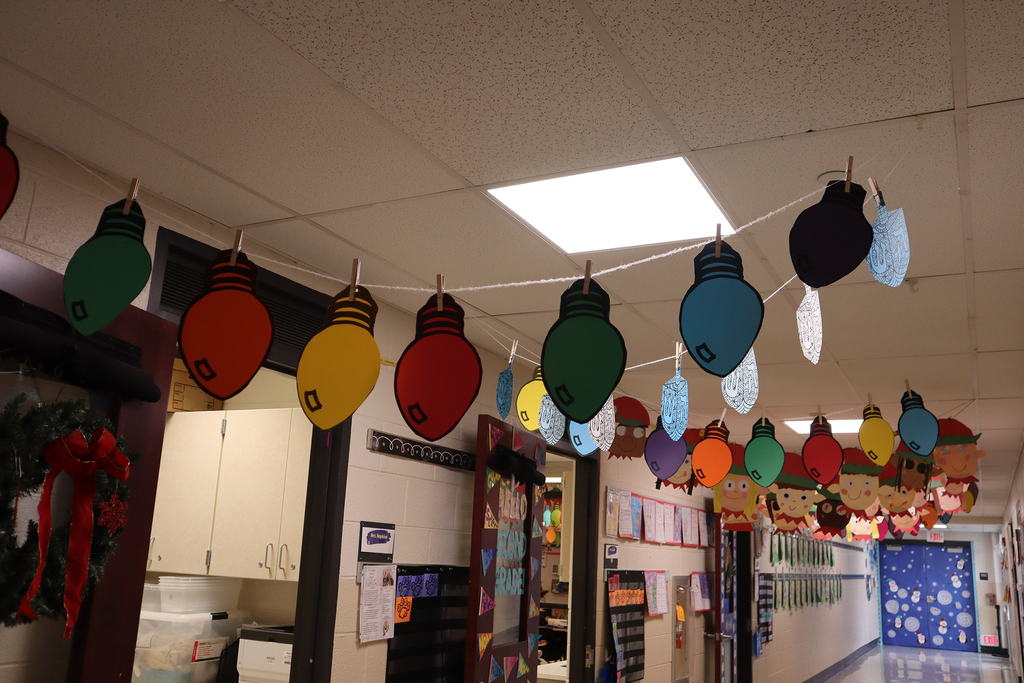Christmas lights and elves hung up in the hallway