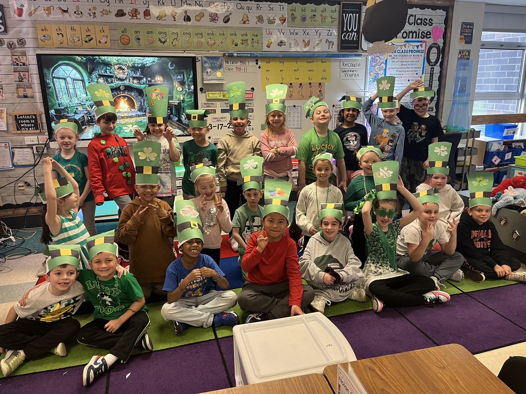 Group of students wearing St. Patrick's Day hats