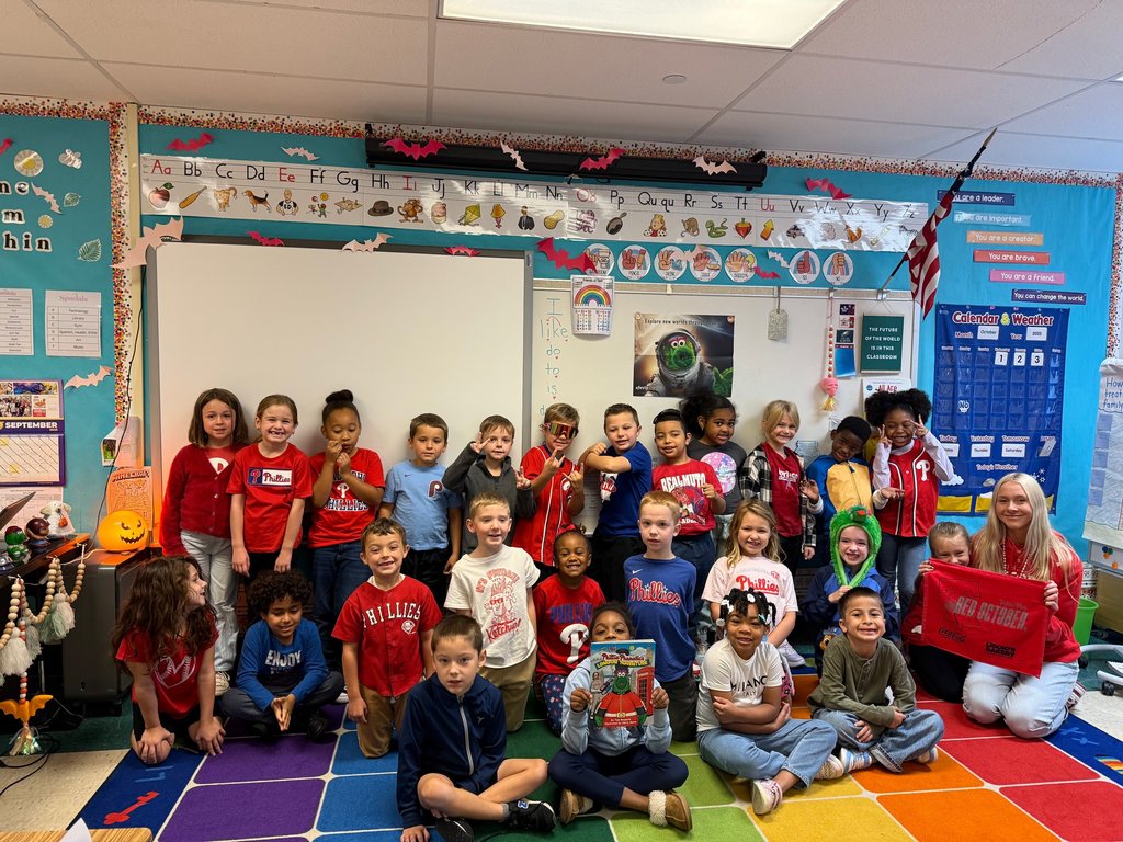 Students pose in Phillies gear