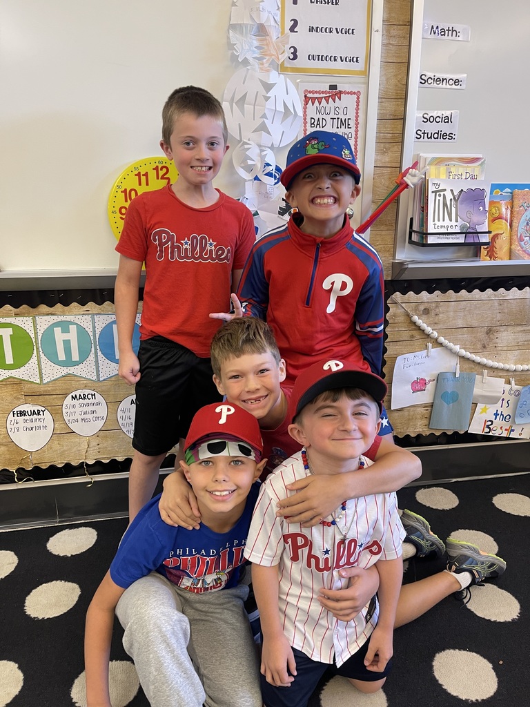 Students pose in Phillies gear