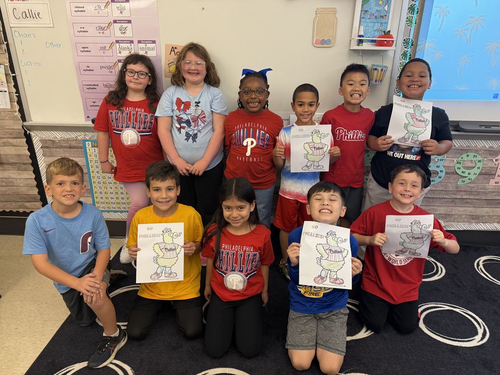 Students pose in Phillies gear