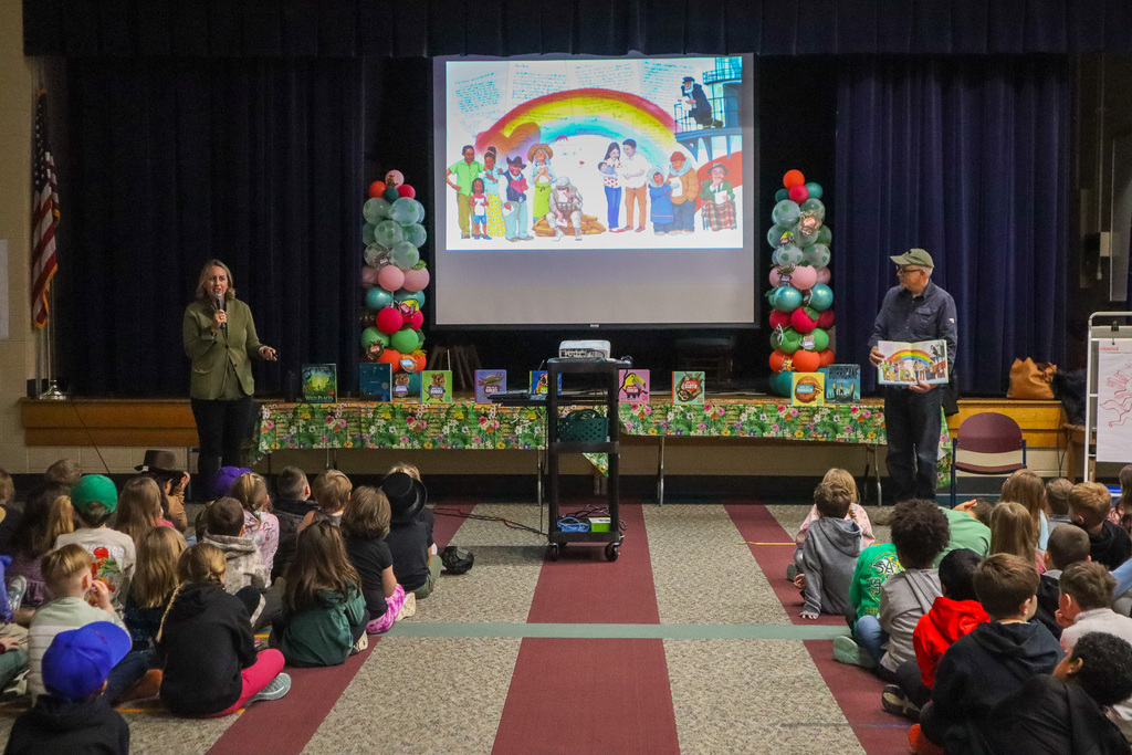 Students watch authors present