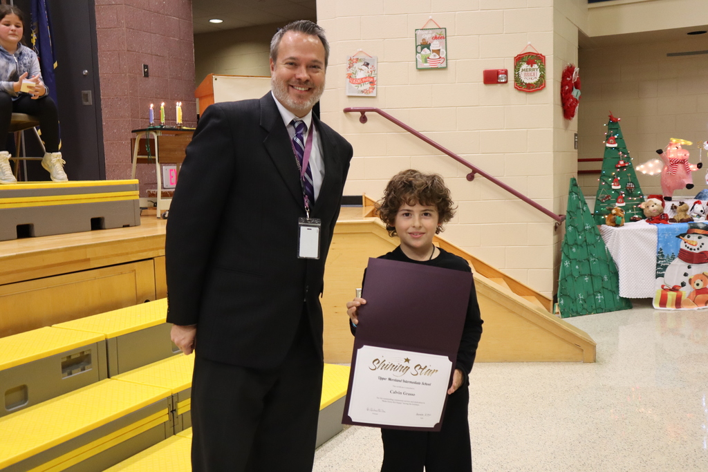 Dr. Bair presents an award to Calvin Grasso