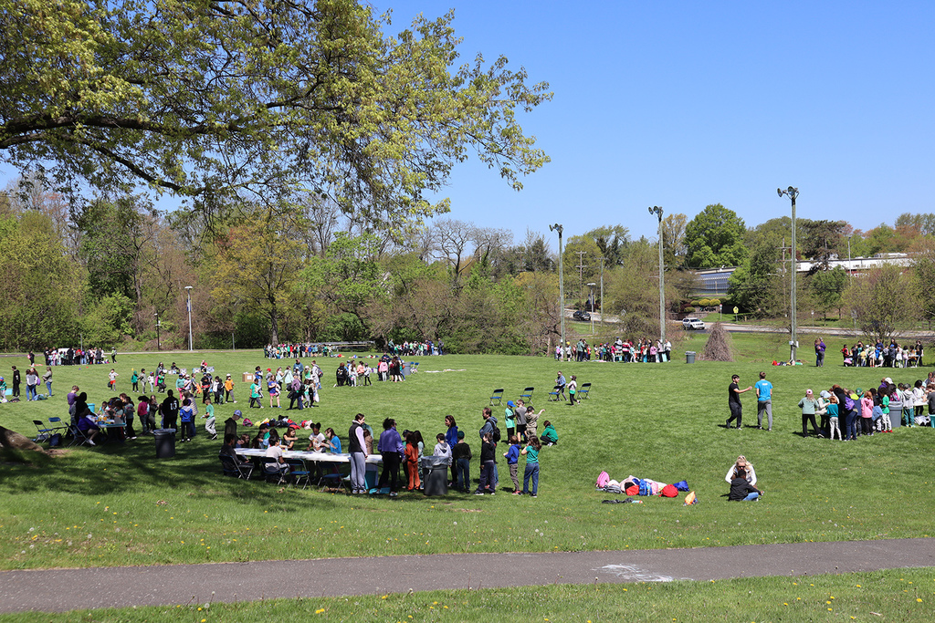Group of students on the UMHS Marching Bands fields at stations