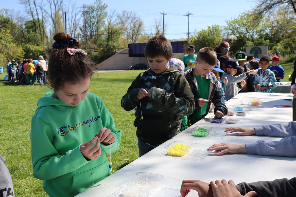 2nd-graders working on Water Cycle bracelets