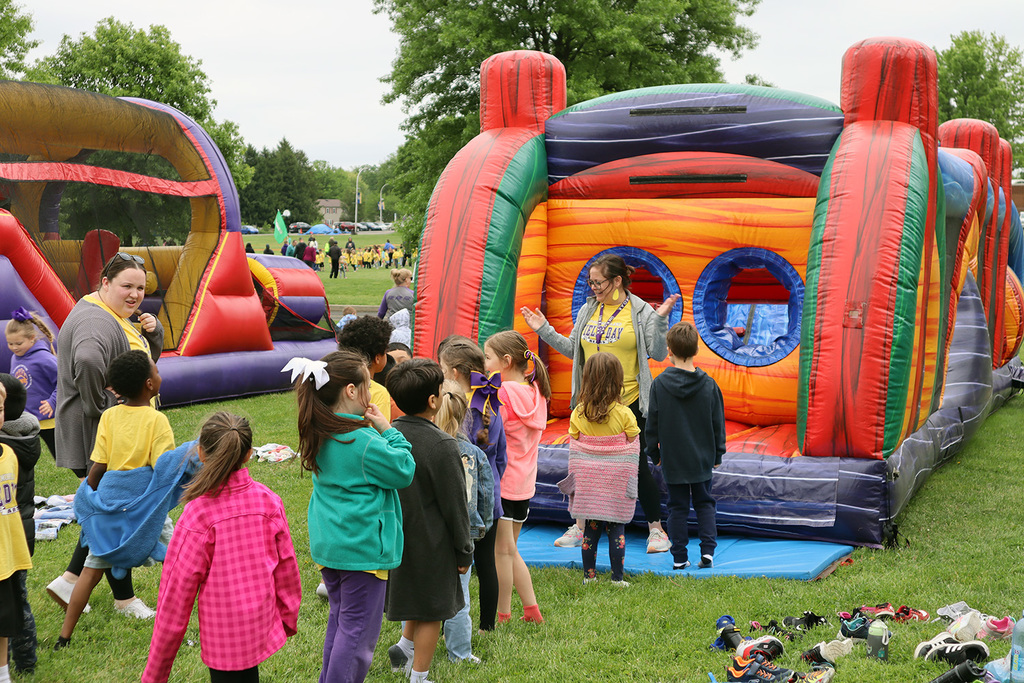 UMPS students in line for a bouncy house