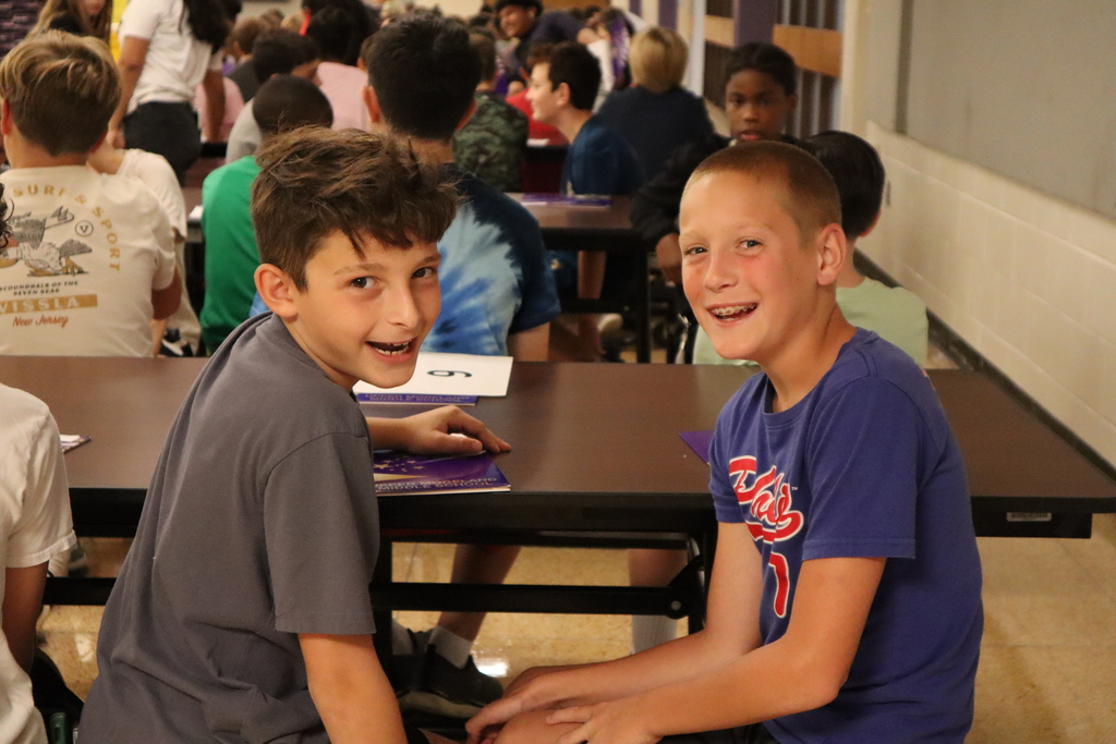 Two 6th grade students smiling for the camera