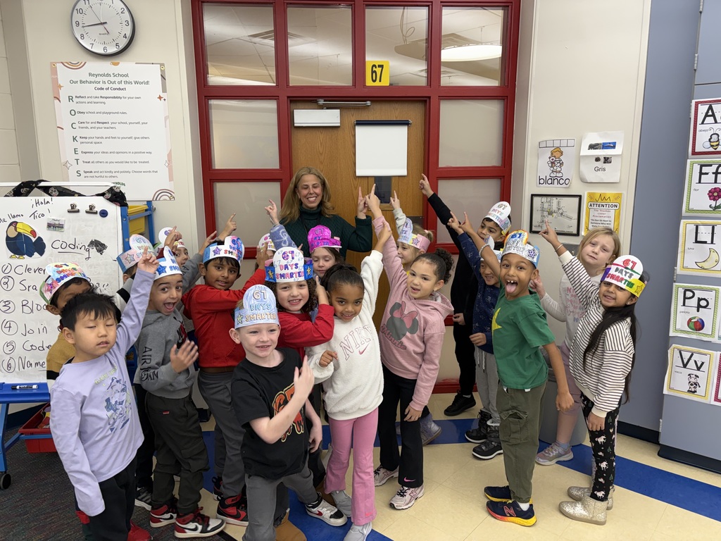 Students pointing to room #67