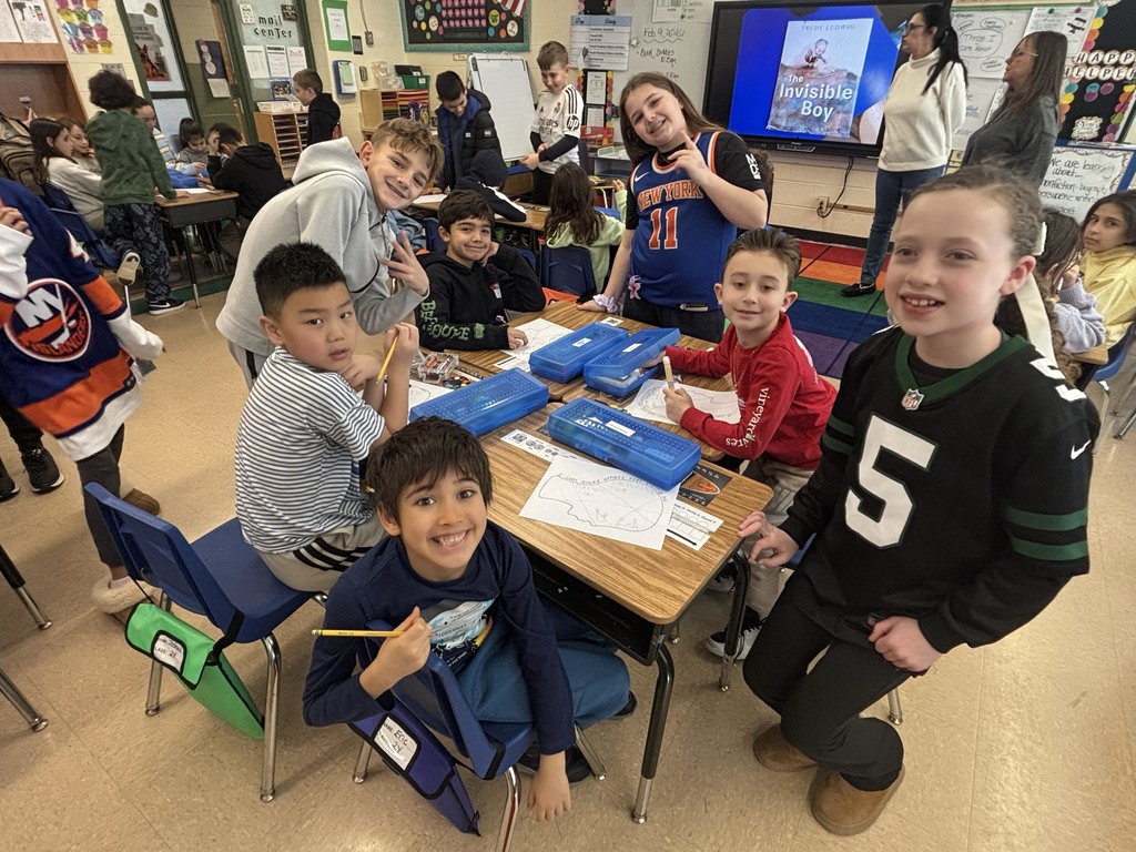 Students from Ms. Aragona's class read to students in Mrs. Vaughan's class