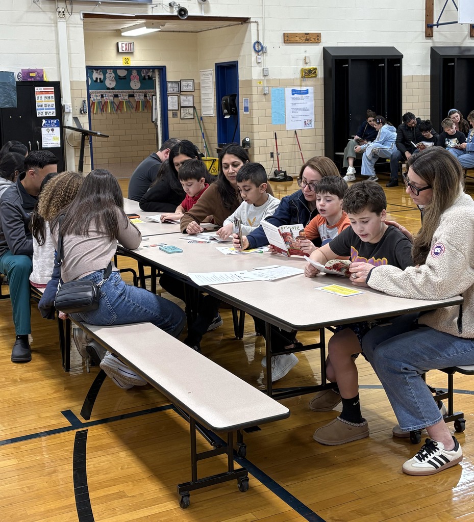Students and parents enjoying the Read-A-Latte Cafe